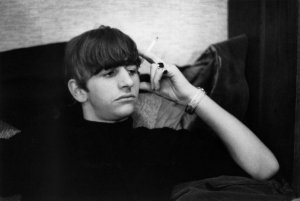 Ringo Starr from The Beatles posed backstage at the Finsbury Park Astoria, London during the band's Christmas Show residency in December 1963.