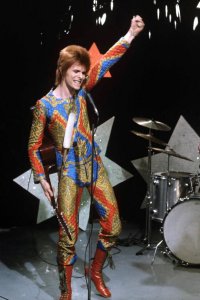 David Bowie turns 68 today, and if there was ever a time to celebrate the icons birthday, its now. Glam rock trended hard on Spring runways (look no further than Saint Laurents glittering party girls for the proof), and the best of the seasons pieces are just starting to hit stores. Turn on The Rise and Fall of Ziggy Stardust and shop the best Bowie-worthy pieces in the slideshow. http://www.style.com/trends/fashion/2015/david-bowie-glam-rock-style