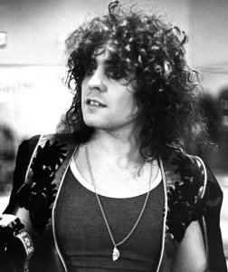 Marc Bolan  I Love to Boogie -- T. Rex  http://www.youtube.com/watch?v=5eiQTFcFPDY