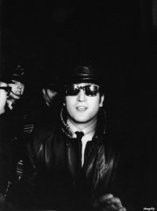 John arriving at the London Palladium, 12 January 1964. Photo by Terence Spencer.