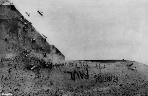 The shadow of the Deauville Hotel falls across the sands of Miami Beach, where the fans wait to catch a glimpse of the Beatles, February 1964. Photo by Robert Freeman