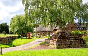 The old market cross at the centre of Chipping Warden, Northamptonshire by Andrew S Brown