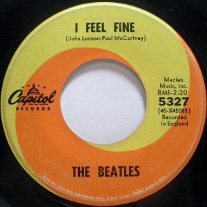      23  1964: The Beatles, I Feel Fine b/w She's A Woman. 