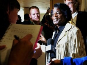 James Brown arriving at Edinburgh Airport in Scotland on Tuesday, July 5 2005, on the eve of the Live-8 concert to be held at Murrayfield Stadium in Edinburgh. Live-8 organizer Bob Geldof, heading to Scotland on Tuesday, said it would be 'grotesquely irresponsible' for politicians to back down from promises of aid for impoverished Africa. Geldof has called for 1 million people to take part in a 'Long Walk to Justice' on Wednesday to pressure Group of Eight leaders meeting this week in nearby Gleneagles. 