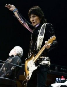 Ronnie Wood, of the Rolling Stones, performs in the 8,000-seat Shanghai Grand Stage in Shanghai, China, Saturday April 8, 2006.