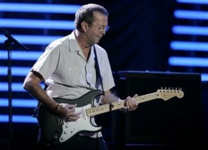 <-- Eric Clapton performs at Madison Square Garden in New York, Thursday, Sept. 28, 2006. 