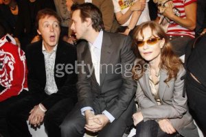 PARIS - OCTOBER 5 : (L-R) Musician Paul McCartney, Alasdhair Willis and Isabelle Huppert attends the Stella McCartney Fashion Show, as part of Paris Fashion Week Spring/Summer 2007 on October 5, 2006 in Paris, France.