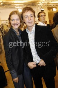 PARIS - OCTOBER 5 : Natalia Vodianova and musician Paul McCartney attend the Stella Mc Cartney Fashion Show, as part of Paris Fashion Week Spring/Summer 2007 on October 5, 2006 in Paris, France. 