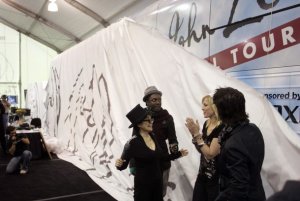 Yoko Ono (L) unveils the new John Lennon Educational Tour Bus with recording artists (L-R) will. i.am of The Black Eyed Peas, Natasha Bedingfield, and Pat Monahan of the band Train, during the unveiling of the new John Lennon Educational Tour Bus at the Consumer Electronics Show (CES) in Las Vegas, Nevada January 7, 2008. The mobile recording studio provides students with free, hands-on opportunity to make music, produce video projects, and make digital photos. 