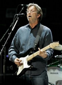 Eric Clapton performs Monday evening Feb. 25, 2008, during the first of their three concerts with Steve Winwood at New York's Madison Square Garden. 